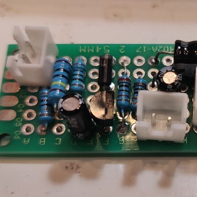 protoype-style circuit board with resistors, capacitors, xhr sockets